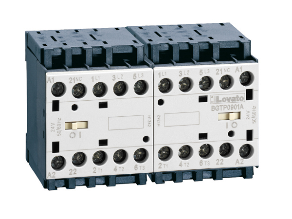 Reversing contactor assembly, AC coil, built-in interlock only with rear PCB solder pins, 9A AC3 in AC, 4kW. Coil voltage 24VAC 50/60Hz