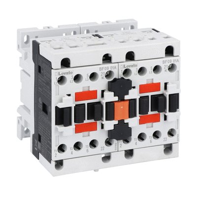 Reversing contactor assembly, AC coil, external interlock with power and auxiliary wiring, 9A AC3 in AC, 4.2kW. Coil voltage 230VAC 50/60Hz
